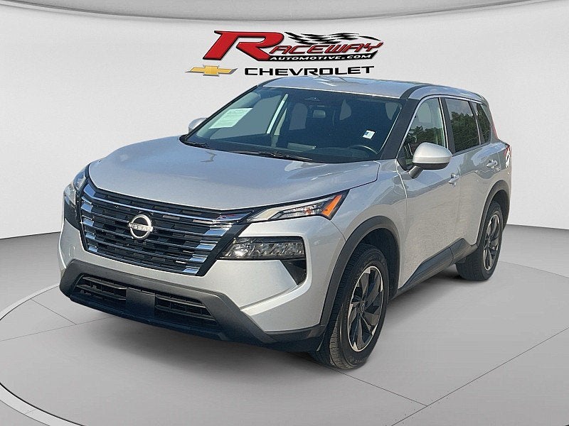 2025 Nissan Rogue SV in Silver Met — front three-quarter view